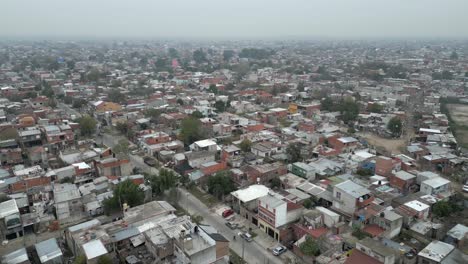 Aerial-circling-residential-neighborhood-of-city-in-Argentina-on-cloudy-day