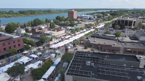 Aerial-view-of-Art-Fair-in-Wyandotte-Michigan,-USA-with-Detroit-River-in-the-background