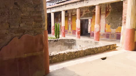 Colorful-frescoes-in-the-interior-courtyard-of-Pompeii