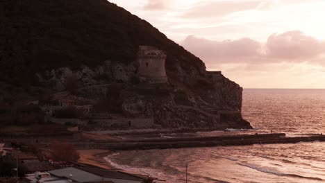Italian-coastline-close-to-Rome-Sabaudia,-Circeo-Close-up-castle-sunset,-pushing-in