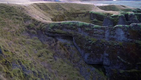 Beautiful-wild-cliff-landscape-at-sunset,-Iceland