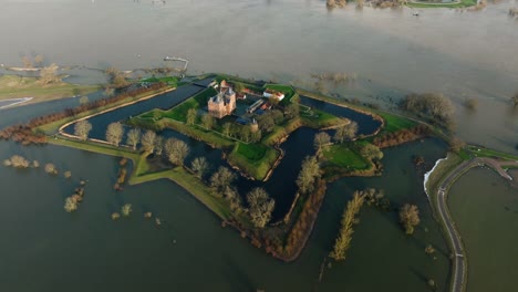 Iconic-Loevestein-castle-in-Poederoijen-surrounded-by-floodwaters