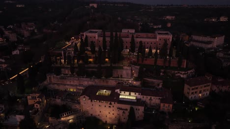 Aerial-Pull-back-Drone-Shot-of-Verona-Roman-Theater-at-Blue-Hour