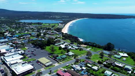 Drone-aerial-landscape-Eden-town-centre-shops-housing-residential-street-Aslings-Beach-Sapphire-Coast-Twofold-bay-Australia