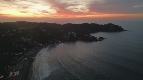 Sayulita-Bay,-Pacific-Ocean-Beach,-Mexican-Village-Aerial-Sunset-Drone-Landscape