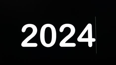 Kodierung-Der-Zahlen-Des-Neuen-Jahres-2024-In-Fettschrift,-Wie-Sie-Auf-Einem-Schwarzen-Hintergrund-Des-Computerbildschirms-Angezeigt-Werden,-Um-Das-Kommende-Jahr-Zu-Feiern