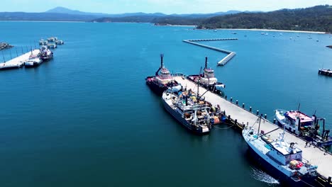 Drone-aerial-Twofold-Bay-waterfront-dock-pier-fishing-trawlers-industry-recreation-tourism-coastline-Eden-Sapphire-Coast-Australia