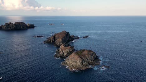 Drone-orbital-view-of-small-rocky-islands