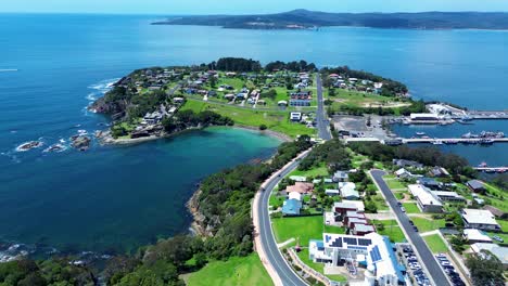 Drone-aerial-landscape-residential-street-housing-commercial-shops-Killer-Whale-museum-Eden-lookout-point-Sapphire-Coast-Twofold-Bay-Australia