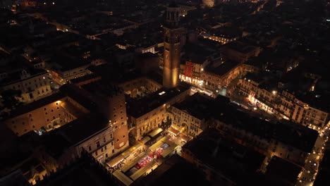Aerial-Rotating-Drone-View-of-Piazza-Dante-Verona-at-Night