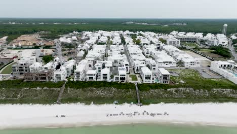 Alys-beach-town-reel-slow-cinematic-white-houses-next-to-ocean-on-daylight