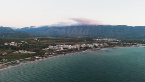Aerial-approach-toward-Albanian-village-resort-near-Adriatic-sea-coast