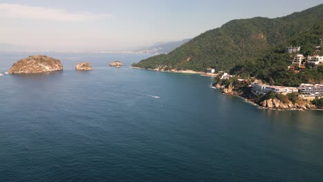 Aerial-Drone-Fly-Above-Ocean-Hill-Sailing-Resorts-of-Mismaloya-Mexican-Beach-Sea-Landscape