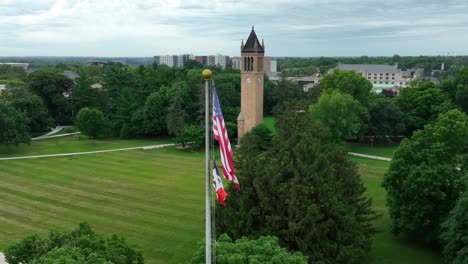 American-flag-and-Stanton-Memorial-Carillon-tower-at-Iowa-State-University-campus-in-summer