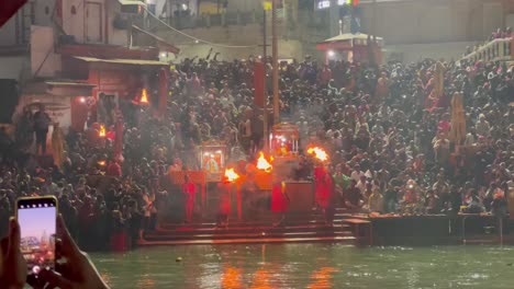 pov-shot-Many-people-are-watching-Ganga-Aarti-and-are-getting-happy