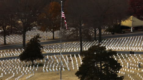 Aerial-lateral-shot-of-large-Cemetery-with-american-flag-in-Fayetteville-,-Arkansas