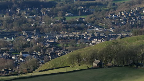 Establishing-Drone-Shot-Looking-Down-on-Settle-Town-and-Fields-Yorkshire