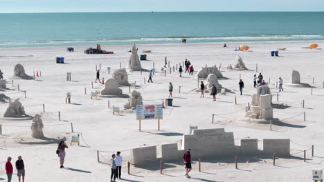 Crowd-of-people-walking-around-looking-at-sand-sculptures-on-Madeira-Beach-at-the-Sanding-Ovations-2023-Master-Cup-event