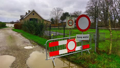 Closed-road-due-to-water-climate-change-crisis-with-high-water-flooding