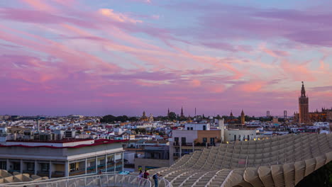 Time-lapse-of-tourists-exploring-iconic-architectural-marvel-of-Setas-de-Sevilla-amid-panoramic-city-view