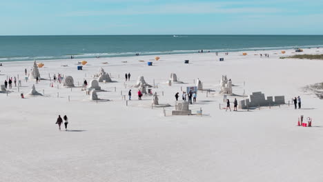 Aerial-drone-fly-over-of-Sanding-Ovations-Sand-Sculpture-Master-Cup-art-event-in-Madeira-Beach,-FL