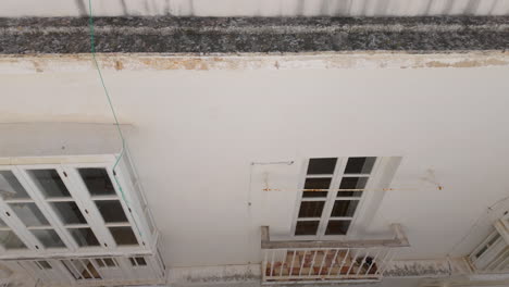 Ceiling-with-a-series-of-old,-open-ventilation-windows