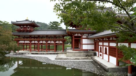 Side-profile-view-of-old-vintage-Byodo-in-Buddhist-Temple-in-Uji,-Kyoto,-Japan