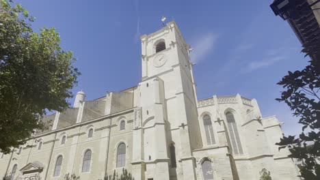 Shot-of-a-large-church-in-France-in-the-sun-in-France-in-the-small-town