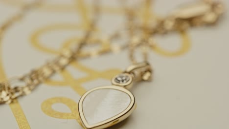 Macro-of-beautiful-diamond-decorated-located-on-a-golden-necklace