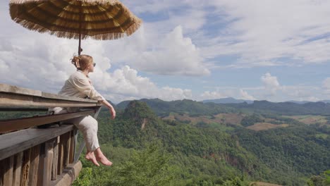 Woman-at-Ban-Jabo-Viewpoint-Enjoys-a-View-with-Scenic-Mountain-Backdrop-in-Mae-Hong-Son,-Thailand