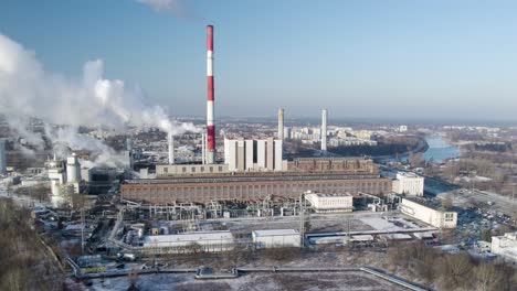 Panoramic-Drone-Fly-Above-Thermal-Power-Station-Industrial-Landscape-White-Smoke-over-Skyline-Landscape