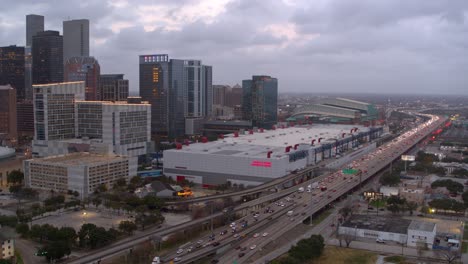 Establishing-aerial-shot-of-downtown-Houston,-Texas-at-night