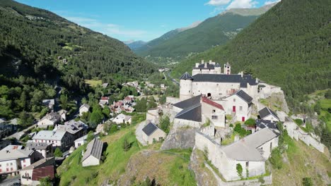 Fort-Queyras-in-Chateau-Ville-Vieille,-French-Alps,-France---Aerial-4k