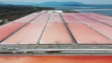 Aerial-view-of-rectangle-shape-sea-salt-farm-artificial-ponds-in-Albania