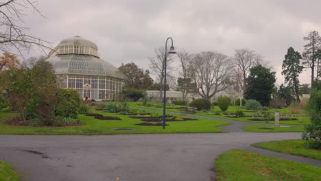 Cinematic-shot-of-vacant-Botanic-Gardens-with-foggy-weather-during-morning-of-winter-season-in-Dublin,-Ireland