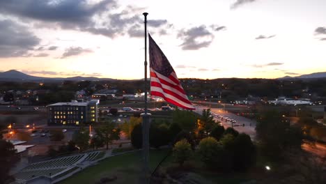 American-flag-waving-during-sunrise-in-Roanoke,-Virginia