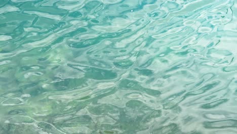 Tropical-blue-ocean-water-with-calm-ripples,-static-view