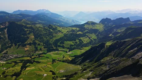 Drone-shot-revealing-Brienzer-Rothorn-mountain-range-of-the-Emmental-Alps,-Switzerland,-Europe