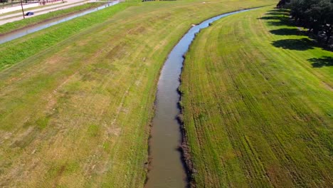Aerial-view-of-water-ditch,-at-60-frames