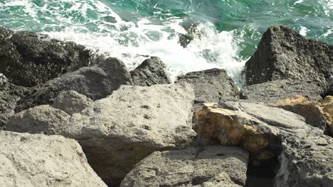 Atlantic-ocean-waves-hitting-rocky-coast-of-Tenerife,-slow-motion