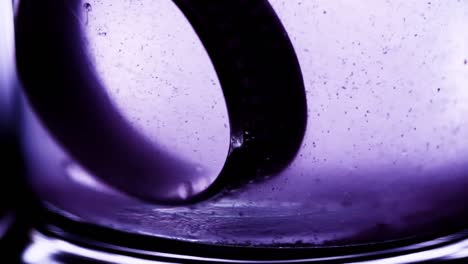 High-speed-slow-motion-of-oil-flowing-in-water-bubbles-slowly-rises-upwards