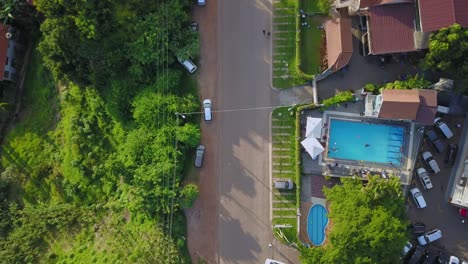 People-Swimming-In-Private-Resort-Along-The-Street-In-Muyenga,-Kampala,-Uganda