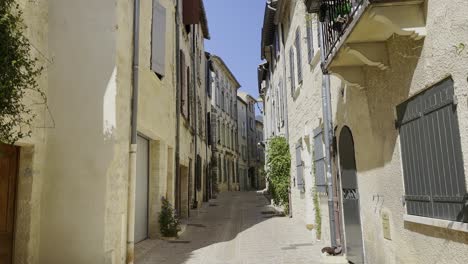 Small-beautiful-French-alley-in-good-weather-in-a-small-French-town-in-good-weather-with-lots-of-windows-and-doors