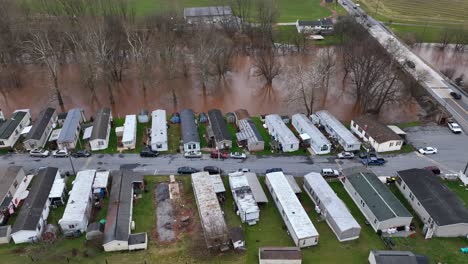 Trailer-park-next-to-a-flooded-river
