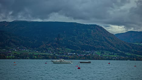 Time-Lapse-boats-buoyant-Landscape-sea-near-coast-under-stormy-sky,-black-clouds