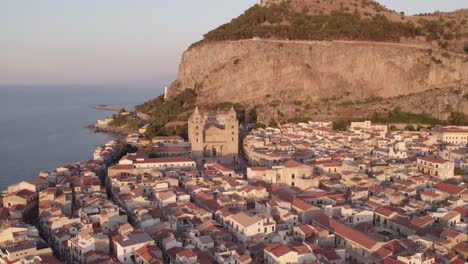 Aerial-drone-view-of-the-famous-Celafu-medieval-old-town-in-Sicily,-Italy