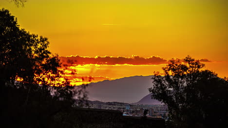Golden-sunrise-time-lapse-over-a-sleepy-mountain-village