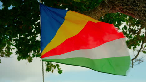 Handheld-close-up-shot-of-Seychelles-national-flag-waving
