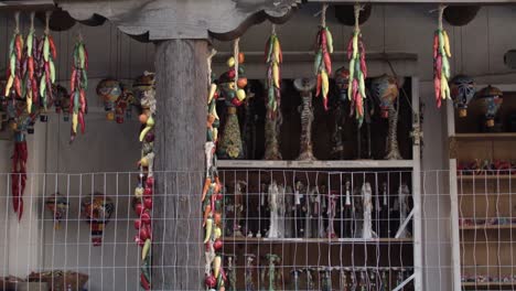 Chili-peppers-hanging-to-dry-in-downtown-Santa-Fe,-New-Mexico-with-stable-video-shot