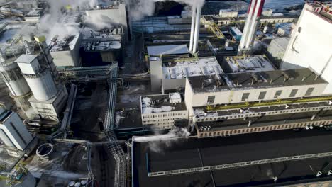 High-tilting-footage-of-the-smoking-and-polluting-heat-and-power-plant-in-Warsaw,-Poland